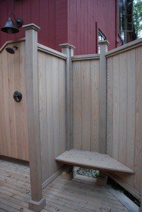 Outdoor Shower Just inside the door is a small changing area seperated from the shower by a partial wall.