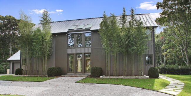 Oyster Shores Contemporary Barn Home Exterior Front Image Oyster Shores modern barn home - PHOTOGRAPHY BY CHRIS FOSTER